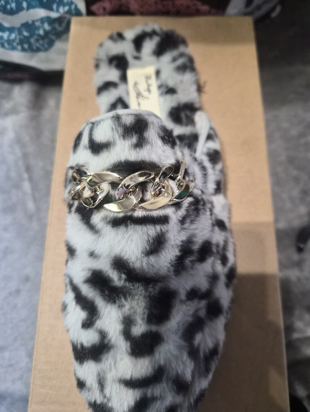 Leopard-Print Faux Fur Slide Slippers with Gold Chain Accent - Black/White - Picture 2 of 5